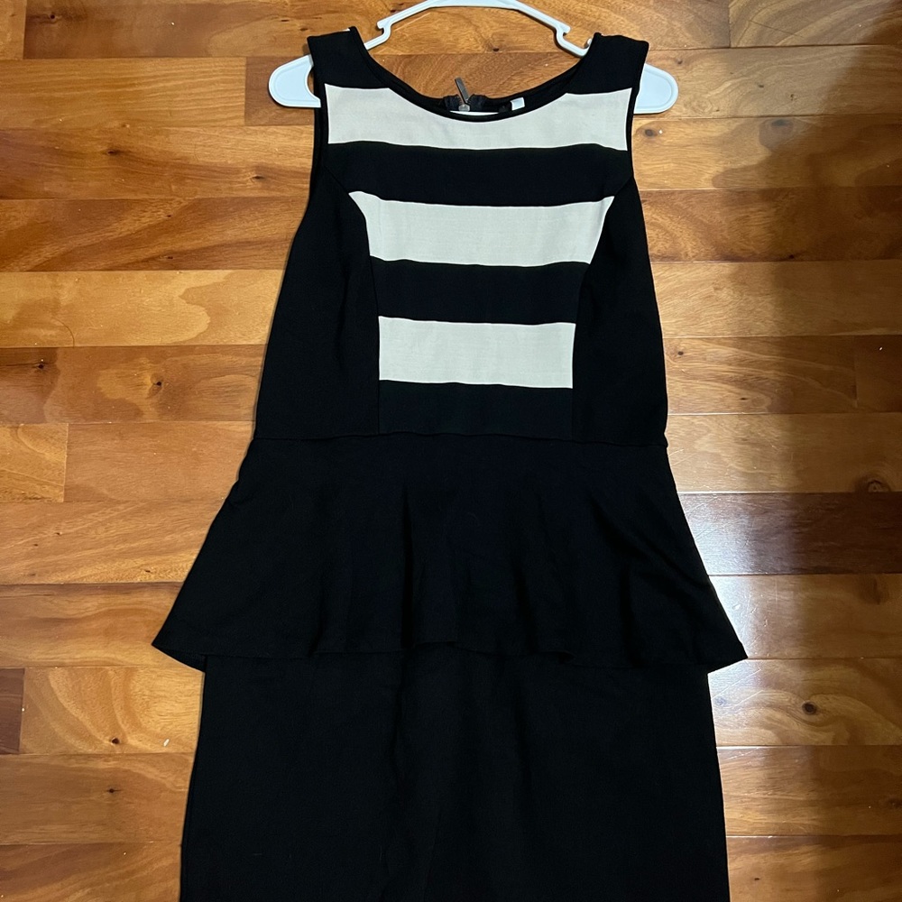 Black and cream peplum dress